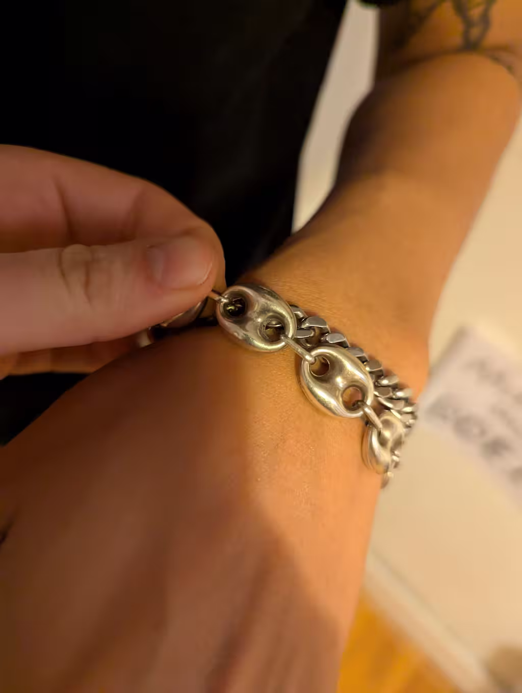 Reference photo, close-up photograph of Raff's bracelet.
